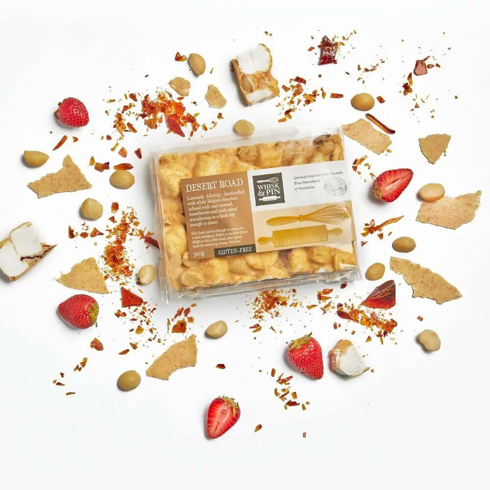 Desert Road Chocolate Block Desert Road Chocolate Block - a white chocolate rocky road made with Belgian white chocolate infused with caramel, salted macadamia and dried strawberries.